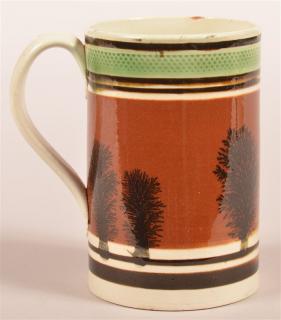 Appraisal: Black Seaweed Mocha Decorated China Tankard - h