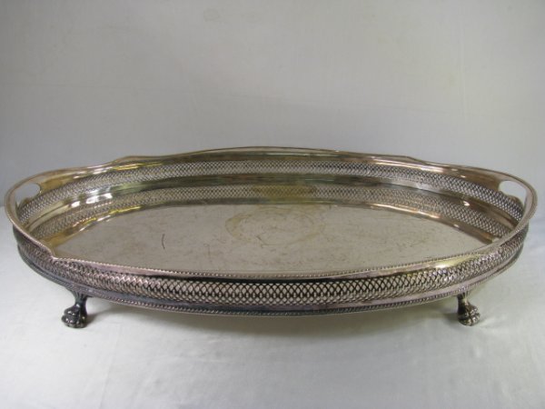 Appraisal: Oval silver plate claw footed reticulated gallery serving tray Unmarked