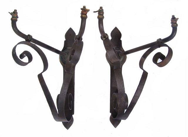 Appraisal: A PAIR OF ART NOUVEAU WROUGHT IRON GAS WALL BRACKETS