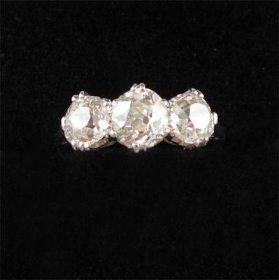 Appraisal: A diamond three stone ring Set with three slightly graduated