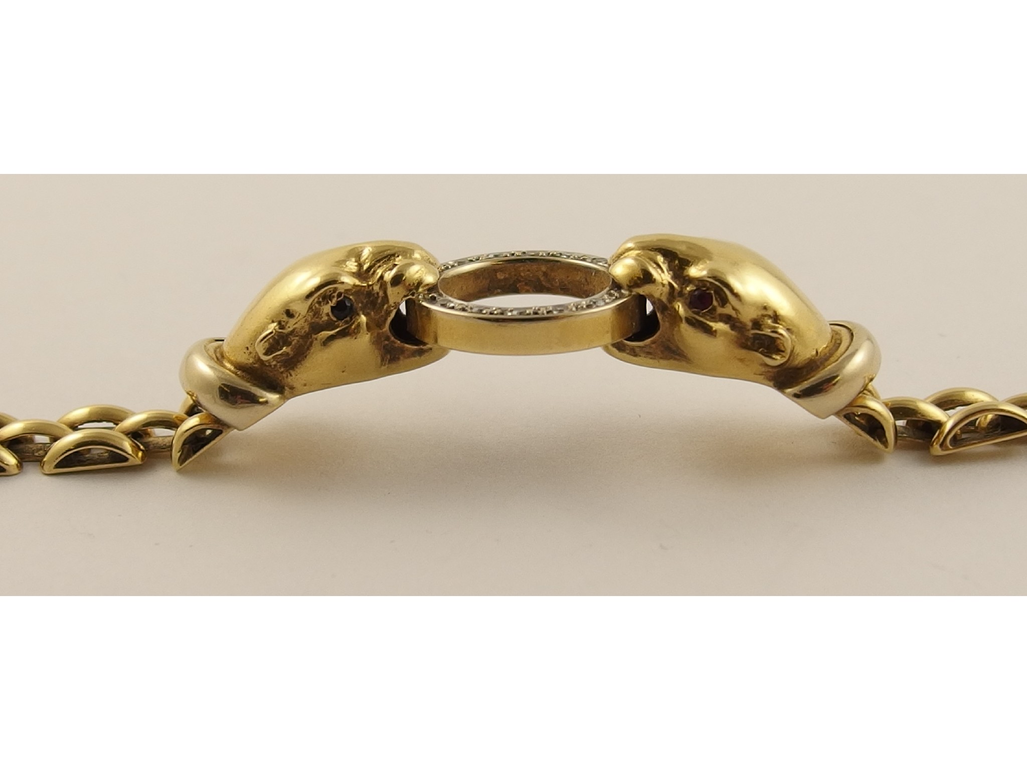 Appraisal: An ct gold leopard head braceletthe yellow gold leopards are