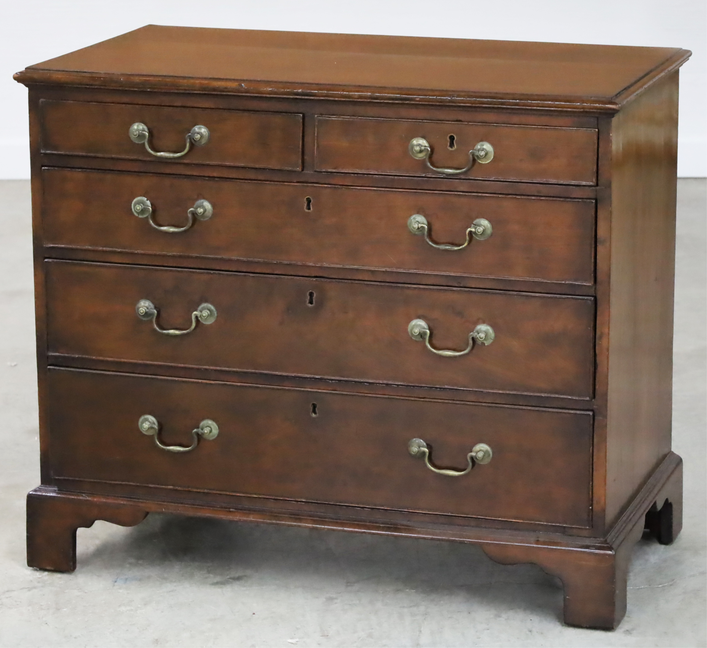 Appraisal: GEORGE III MAHOGANY BACHELORS CHEST George III mahogany bachelors chest