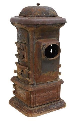 Appraisal: Architectural cast iron stove having domed top over cylindrical body