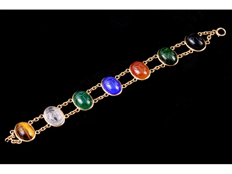 Appraisal: k Yellow Gold Scarab Bracelet containing seven mm scarabs of