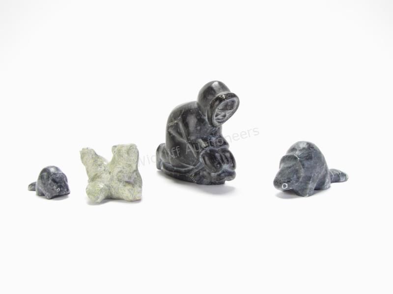 Appraisal: Four Inuit-type carvings including Eskimo Art stone carving of figure