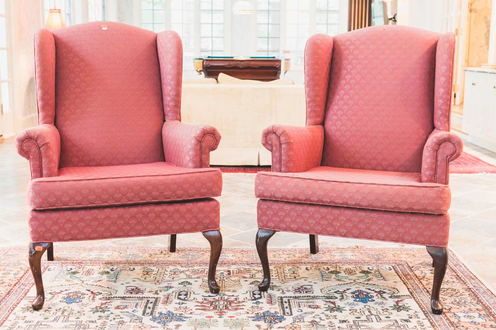 Appraisal: Pair of Queen Anne style upholstered wing chairs in H