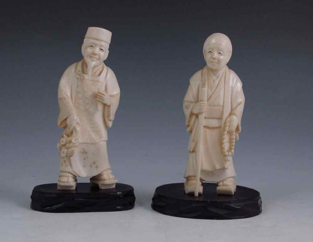 Appraisal: PIECE JAPANESE CARVED IVORY FIGURES To include Man holding net