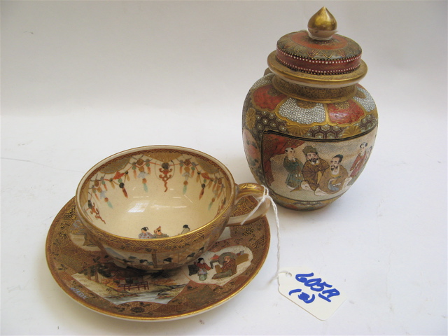 Appraisal: THREE JAPANESE SATSUMA POTTERY PIECES cup and matching saucer hand