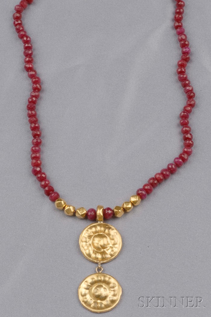 Appraisal: Ruby Bead Pendant Necklace composed of ovoid faceted ruby beads