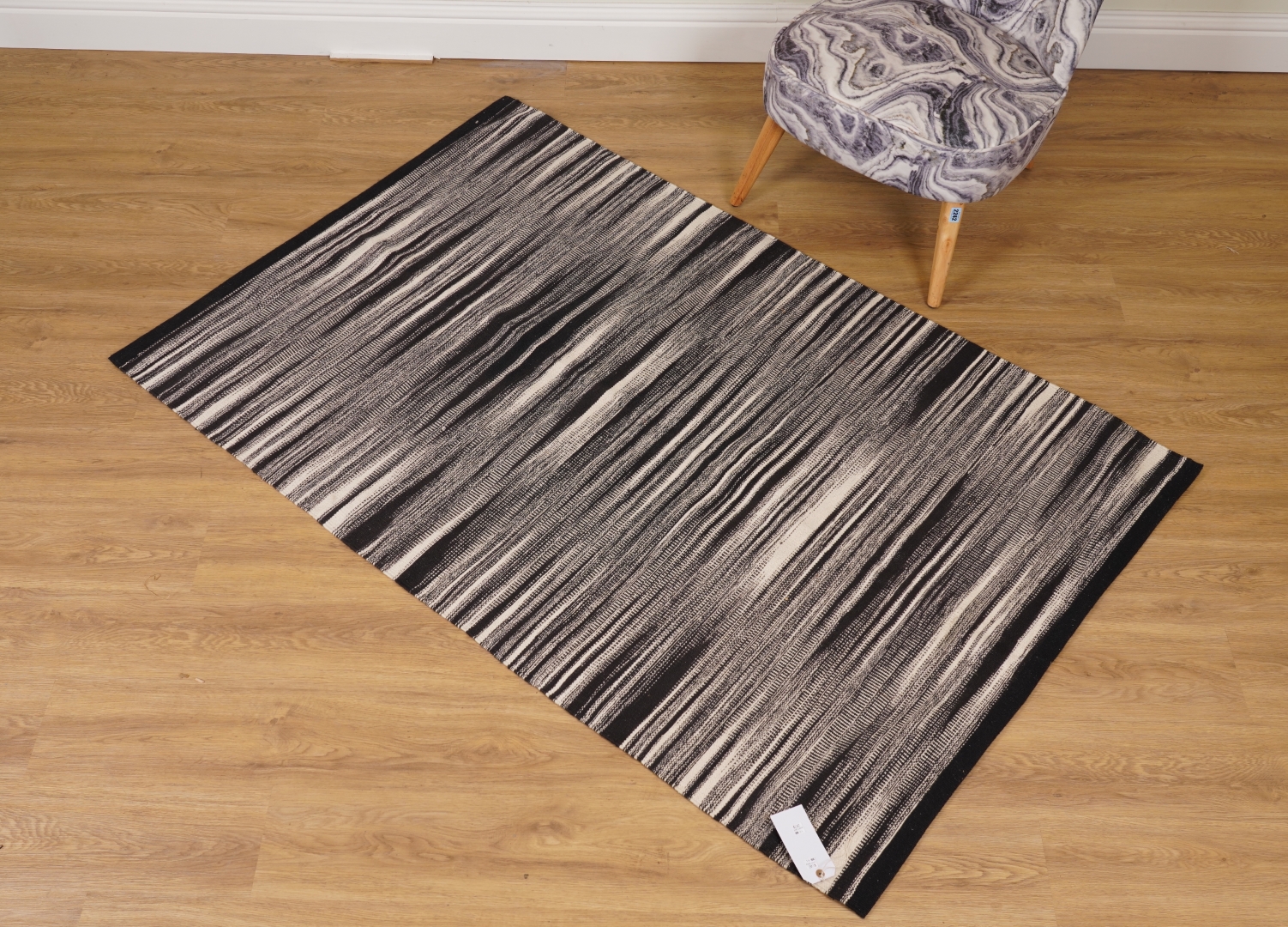 Appraisal: HABITAT TWO BLACK AND WHITE FLATWEAVE RUGS cm wide cm