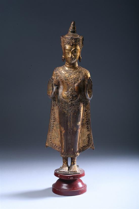 Appraisal: ASIAN GILT BRONZE FIGURE OF DEITY Standing wearing long robe