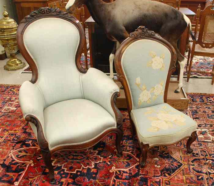 Appraisal: TWO VICTORIAN CARVED AND UPHOLSTERED CHAIRS American Louis XV sub-style