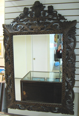 Appraisal: AN AMERICAN RECTANGULAR WALL MIRROR with hand carved wood frame