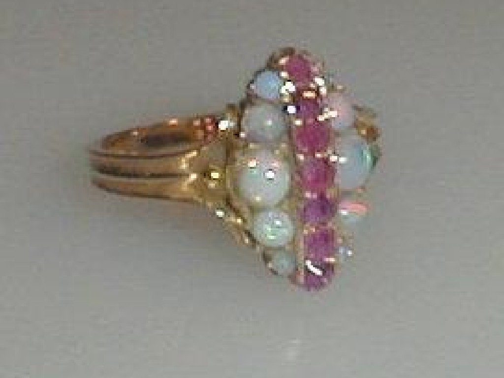 Appraisal: A Victorian dress ring an oval head set up finger