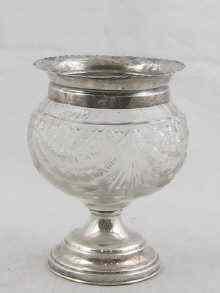 Appraisal: A silver mounted cut glass vase on silver pedestal foot