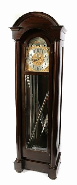 Appraisal: A tall case mahogany clock with Westminster chimes height ft