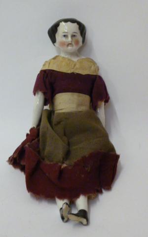 Appraisal: A late th early th century china shoulder head doll