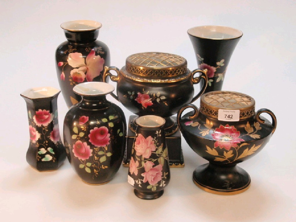 Appraisal: Falcon ware black ground rose decorated rose bowls and vases