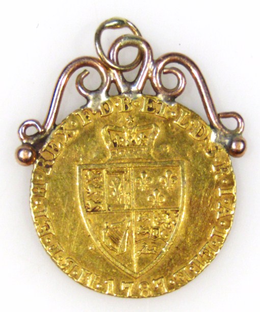 Appraisal: A George III gold half guinea shield back dated with