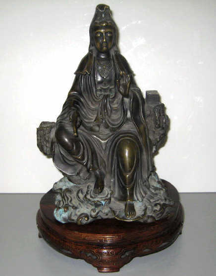 Appraisal: ASIAN BRONZE GUAN YIN GODDESS OF MERCY Seated on a