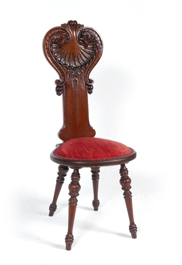 Appraisal: CARVED OAK SHELL BACK HALL CHAIR Extended back with carved