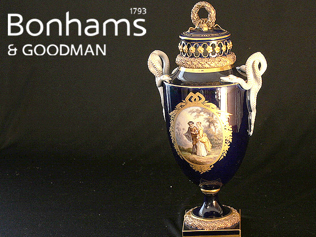 Appraisal: A Meissen twin-handled urn shaped vase and cover each side