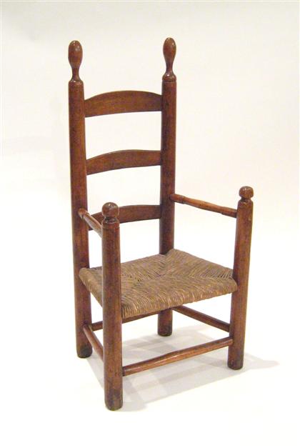 Appraisal: Child's maple slat-back armchair th century Bulbous finials atop ring-turned