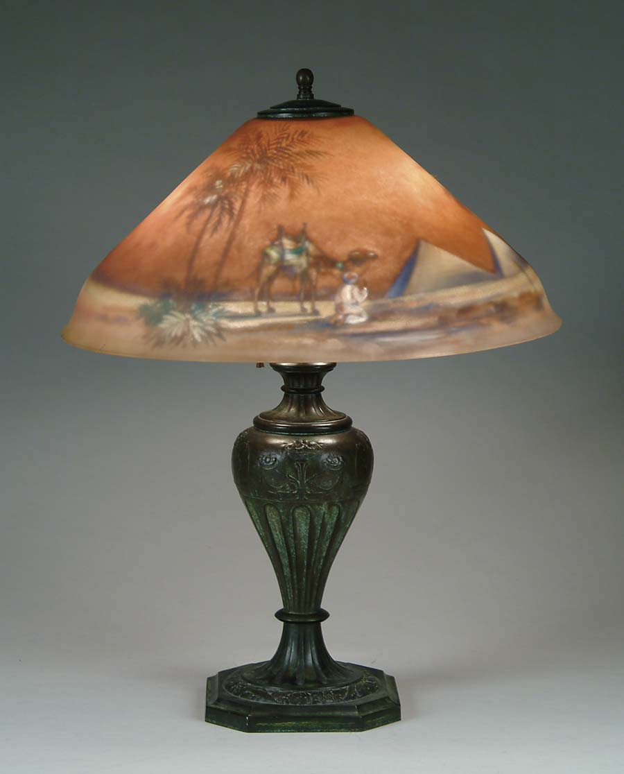 Appraisal: PAIRPOINT GARDEN ALLAH LAMP Pairpoint table lamp has reverse painted