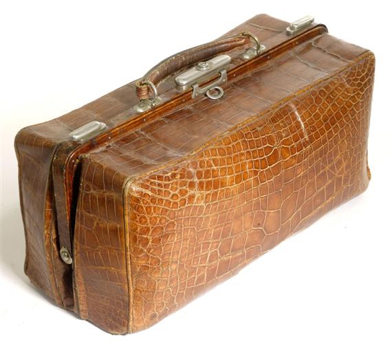 Appraisal: DOCTOR'S CASE crocodile leather White metal locks Interior lined with