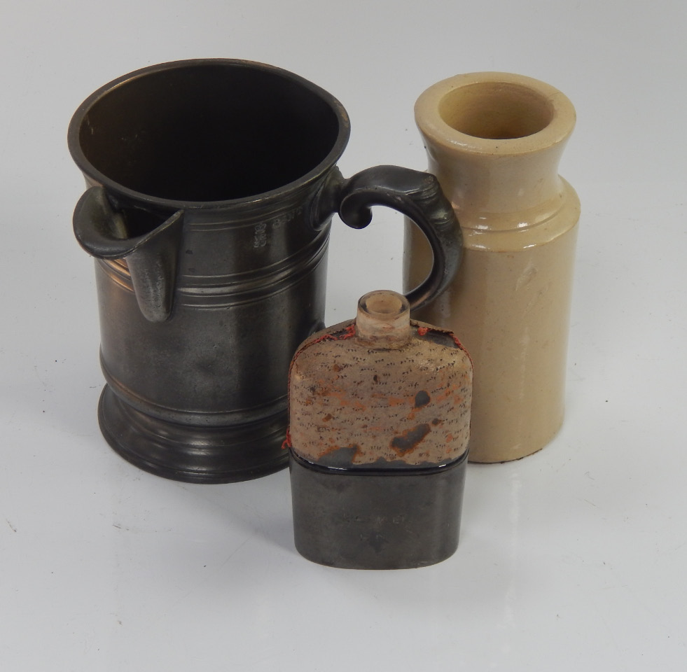 Appraisal: A stoneware bottle marked W Barrie of Manchester and London