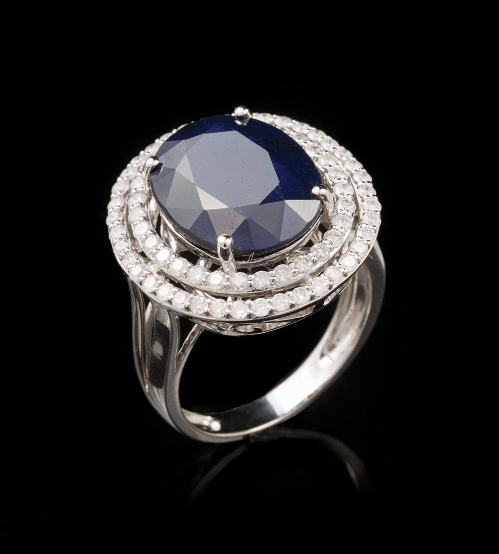 Appraisal: kt White Gold Blue Sapphire and Diamond Ring center prong