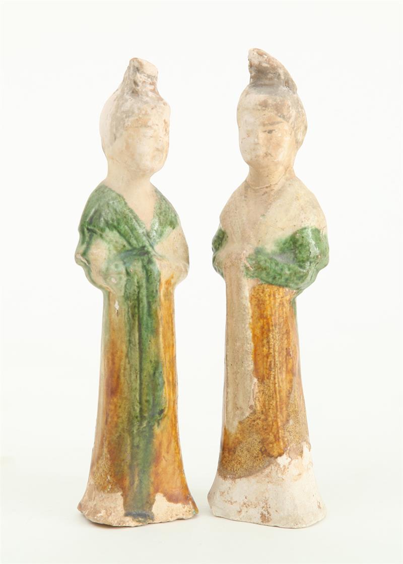 Appraisal: TWO SIMILAR TANG SANCAI-GLAZED POTTERY FIGURES OF FEMALE MOURNERS AND