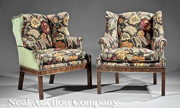 Appraisal: A Pair of Large Chippendale-Style Carved Mahogany Wing Chairs decoratively