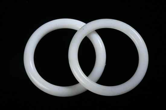 Appraisal: TWO CHINESE WHITE JADE BANGLES - Inside in diam