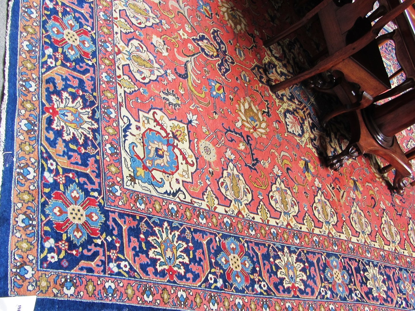 Appraisal: A Tabriz carpet Persian the pink field with an indigo