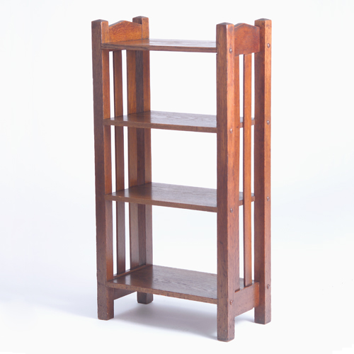 Appraisal: Harden magazine stand with V-shaped side stretchers four shelves and