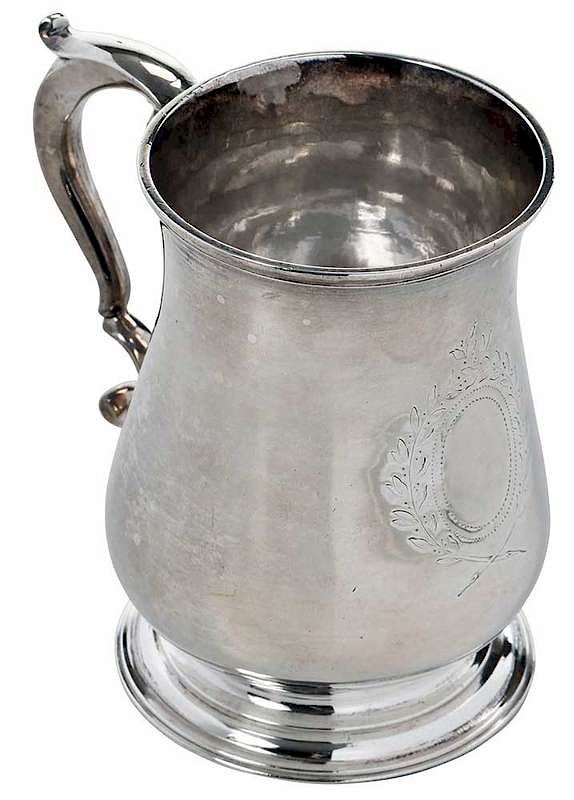 Appraisal: George II English Silver Mug London bulbous form scroll handle