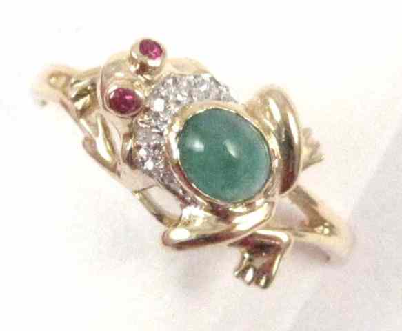 Appraisal: EMERALD DIAMOND AND DIAMOND RING k yellow gold depicting a