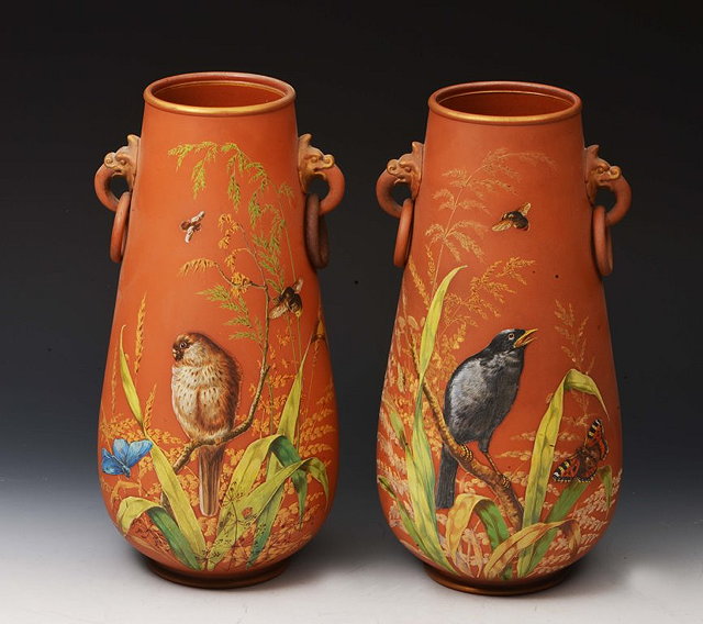 Appraisal: A PAIR OF WATCOMBE TERRACOTTA TAPERING POTTERY VASES each decorated