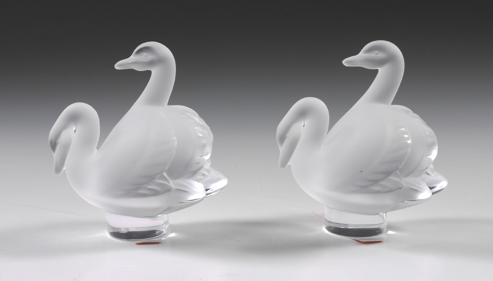 Appraisal: PAIR LALIQUE CRYSTAL CYGNES SWAN PAPERWEIGHTS Pair frosted glass double