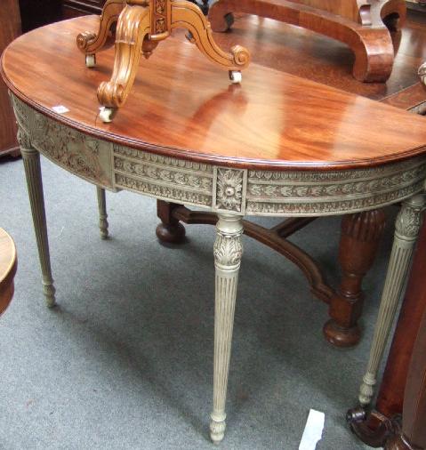 Appraisal: A mahogany and grey painted demi-lune console table of George