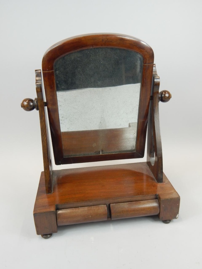 Appraisal: A late Victorian mahogany dressing table mirror the rectangular plate