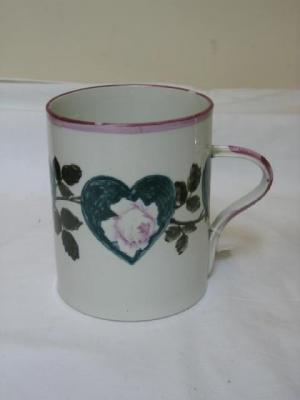 Appraisal: A WEMYSS POTTERY CYLINDRICAL MUG painted in pastel pink with