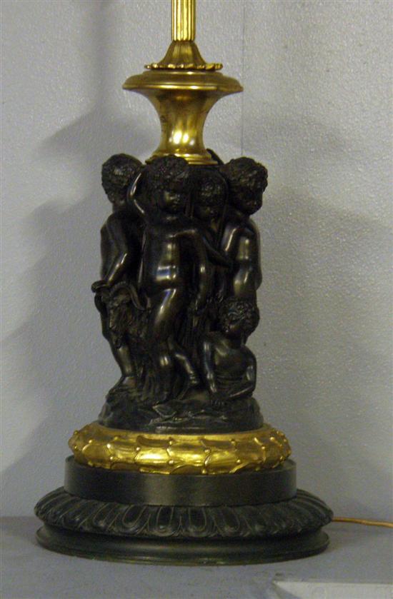 Appraisal: Bronze and gilt metal lamp base modelled as seven putti