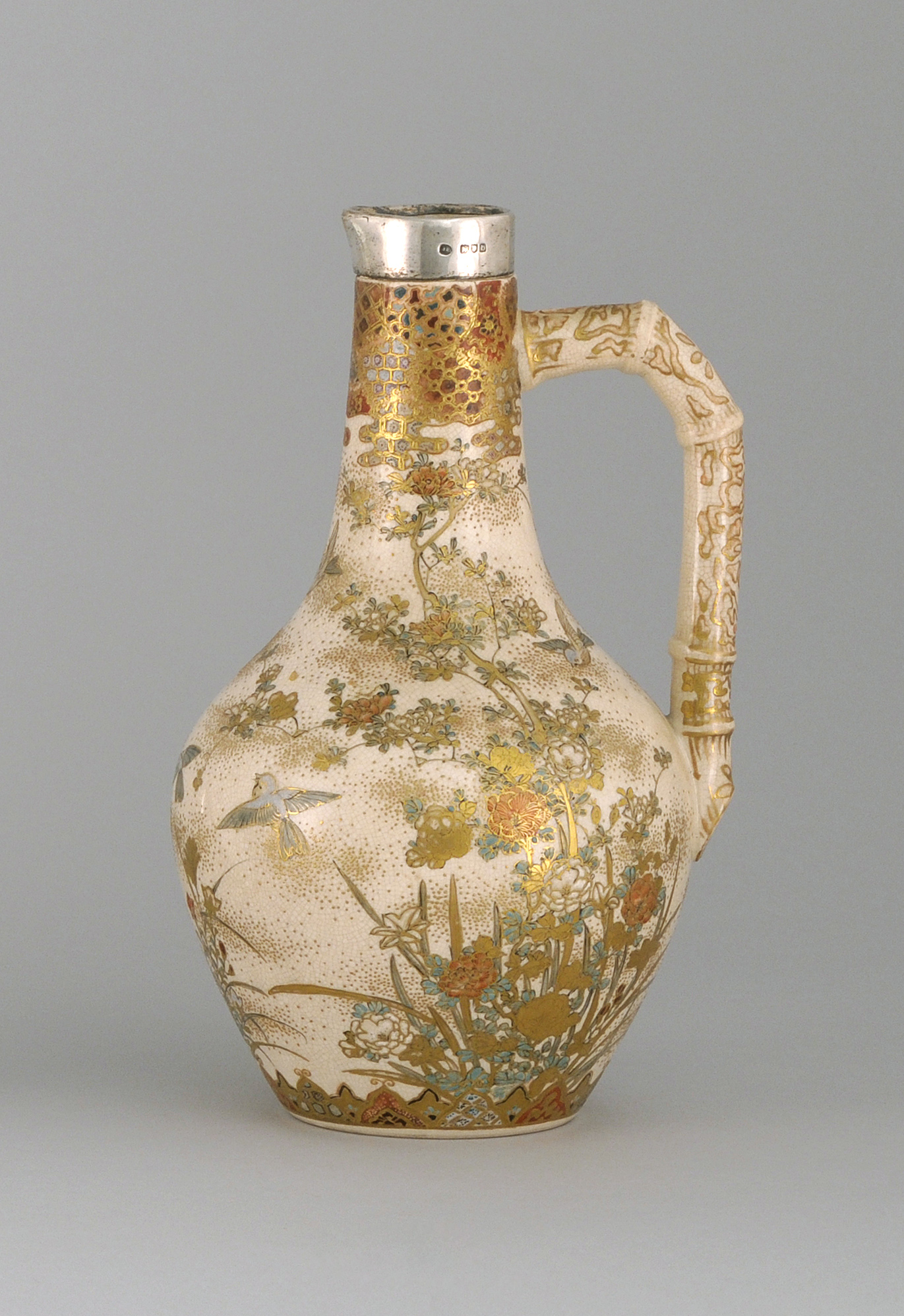 Appraisal: SATSUMA POTTERY EWER Meiji PeriodIn teardrop form with bamboo-design handle