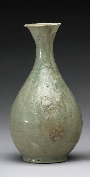 Appraisal: A celadon glazed stoneware bottle th th Century Of inverted