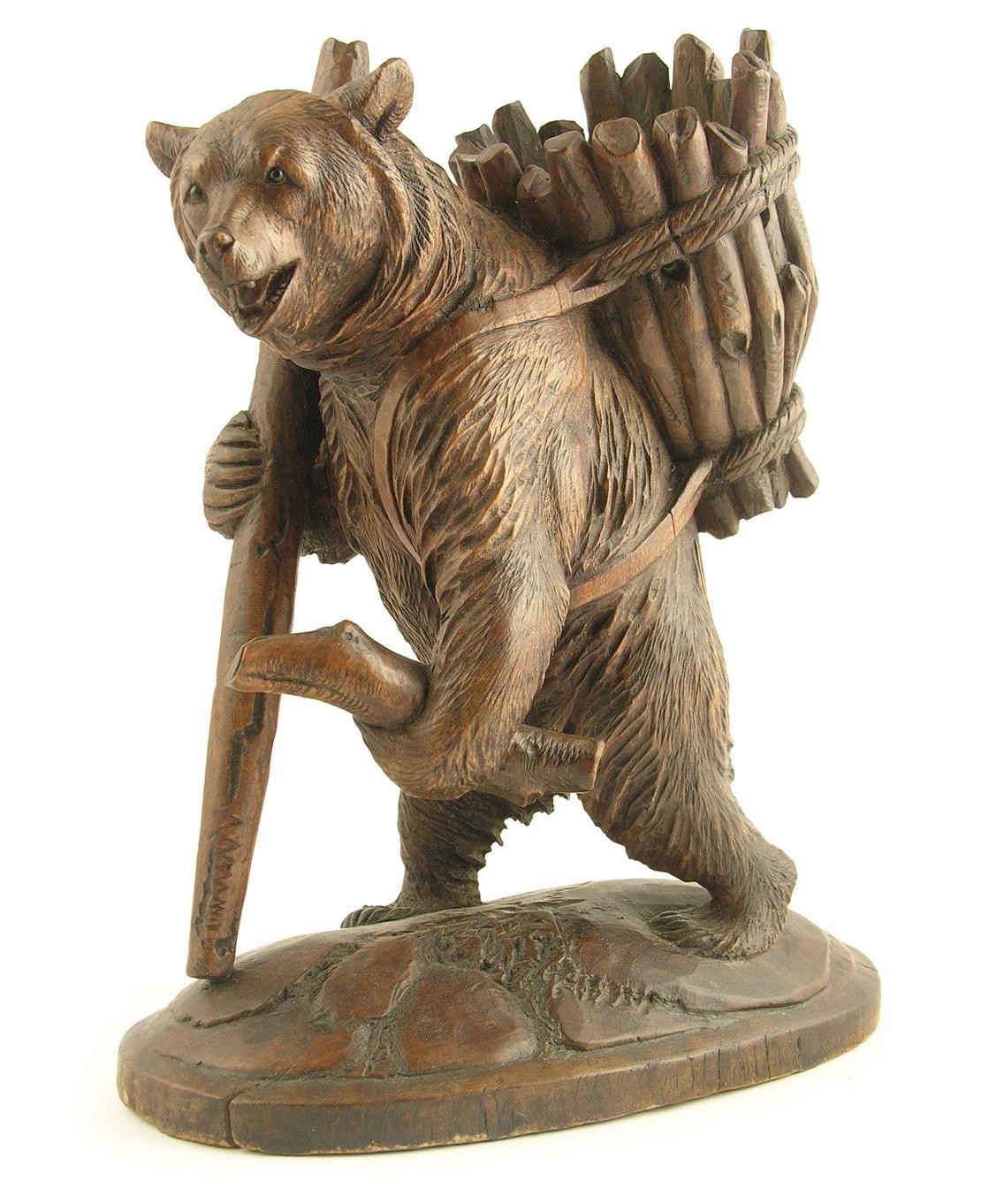 Appraisal: A Black Forest carved wood model of a standing bear