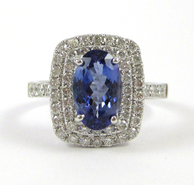 Appraisal: TANZANITE DIAMOND AND FOURTEEN KARAT GOLD RING The white gold