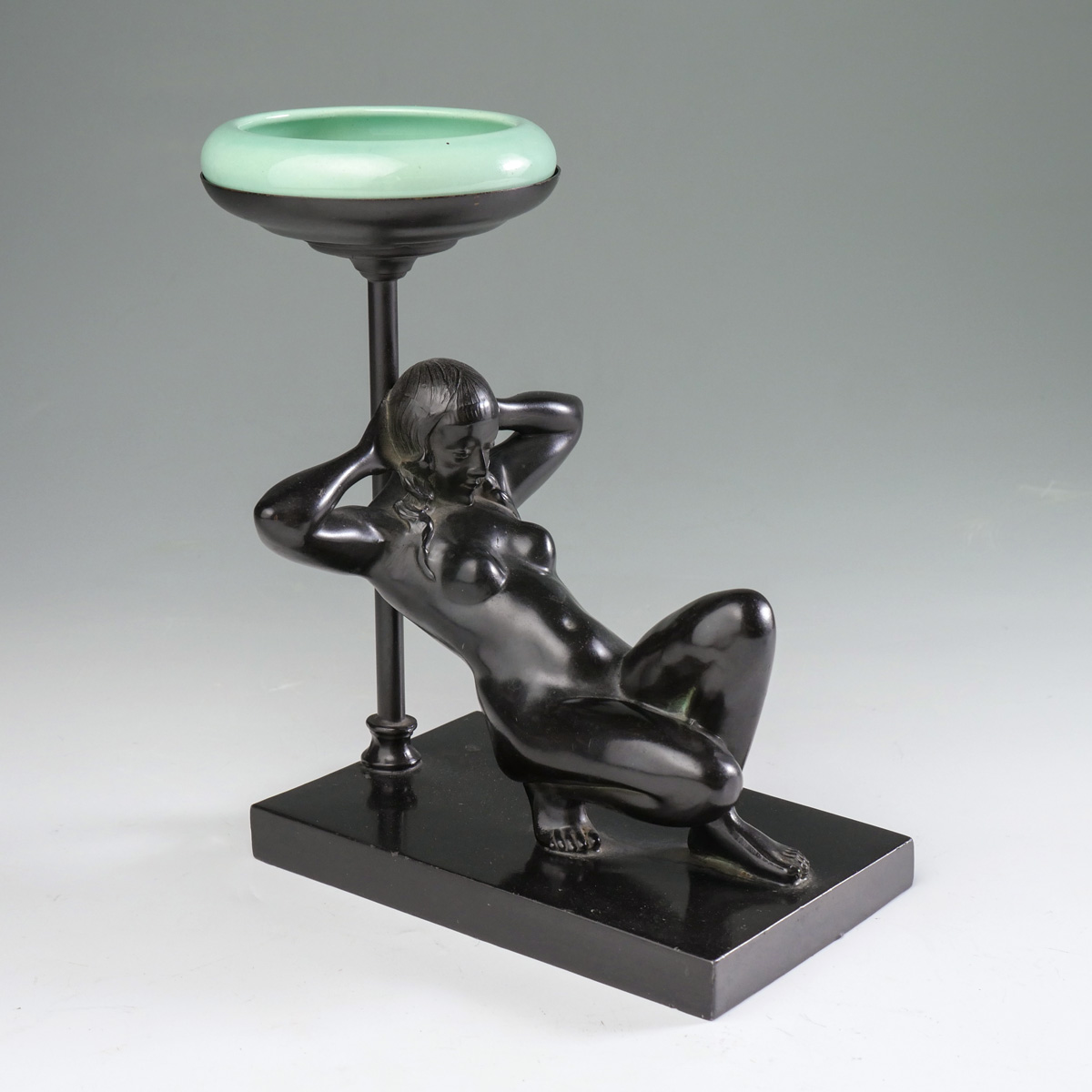 Appraisal: LAID BACK NUDE DECO WOMAN CAST METAL PIN TRAY ''