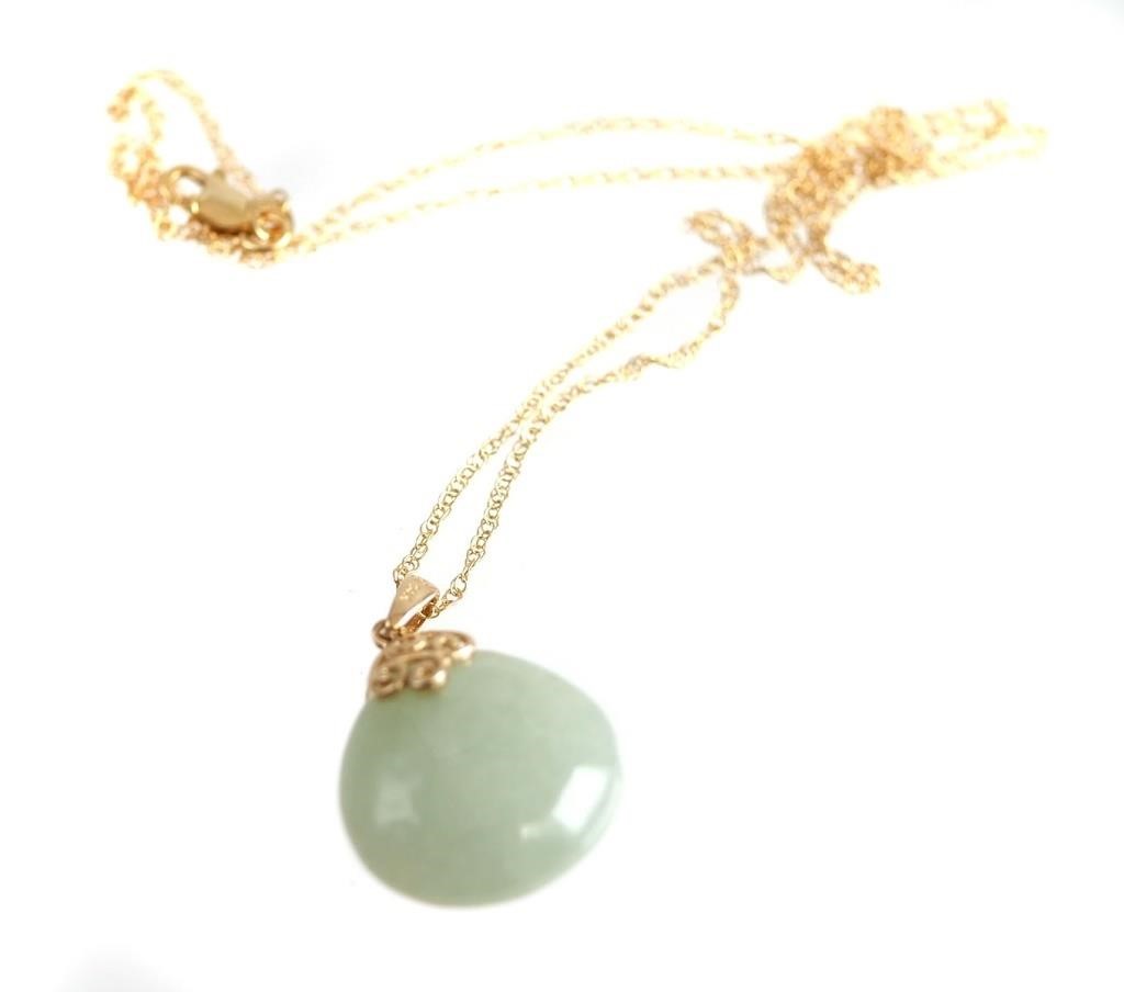 Appraisal: K YELLOW GOLD JADE NECKLACE K yellow gold jade pendant